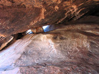 _another site of Aboriginal art, though you have to crawl to see it